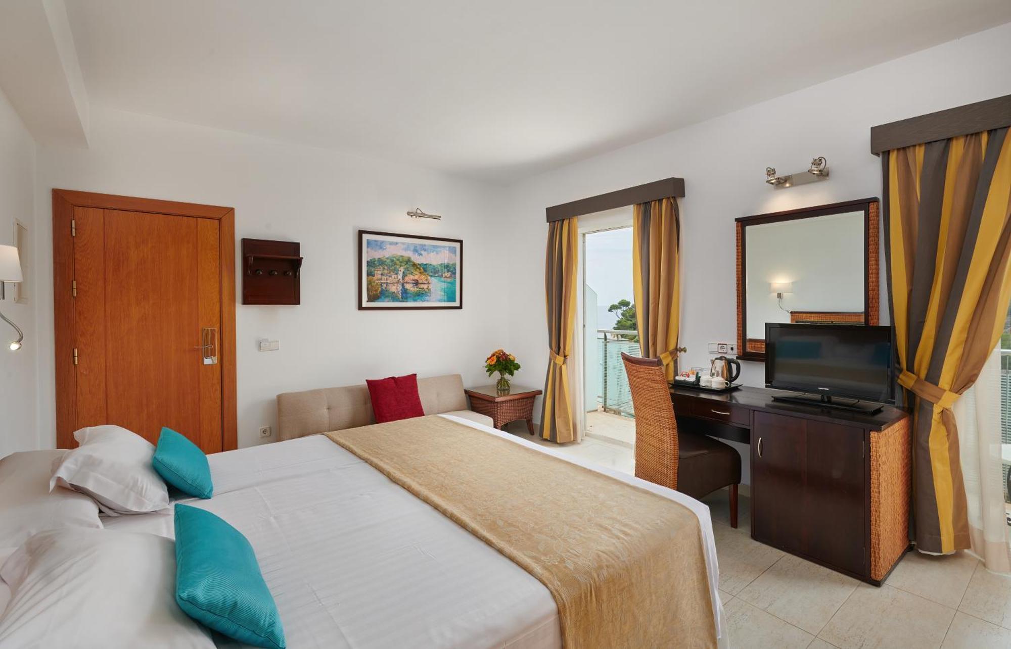 Hotel Apartamentos Cala ซานตานยี ภายนอก รูปภาพ